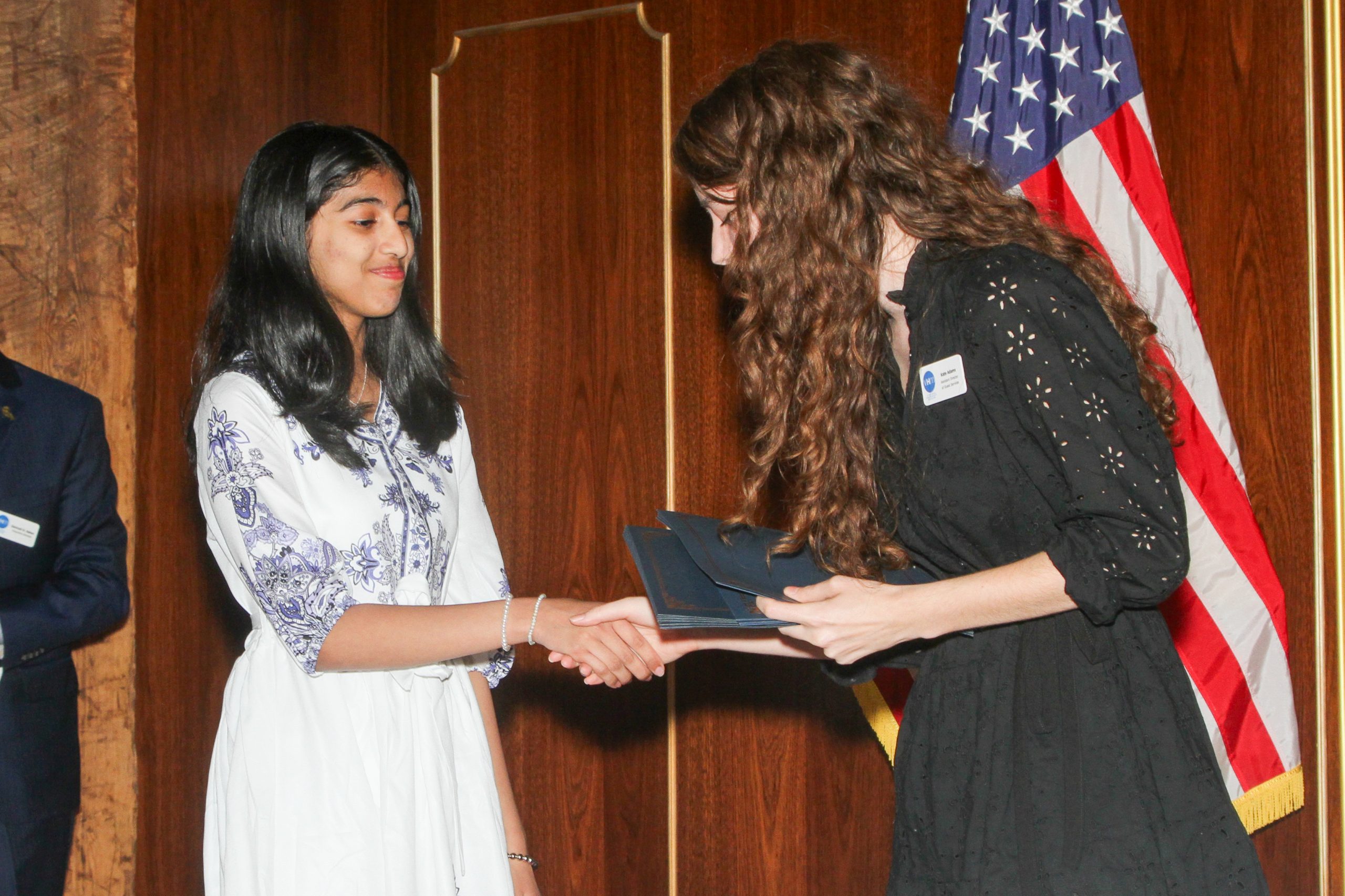 Student accepting an art award at Youm HasShaoh 2024.
